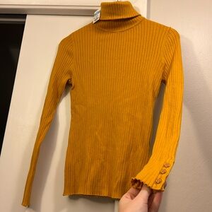 NWT J McLaughlin mustard yellow ribbed turtleneck, button detail on sleeve